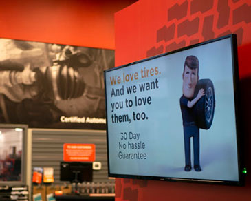 commercial digital signage in a Kal Tire location that provides information for customers, created by 10net